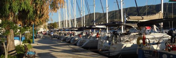 A summer weekend in Poros with the yachts alongside the Poros quay awaiting their new crews