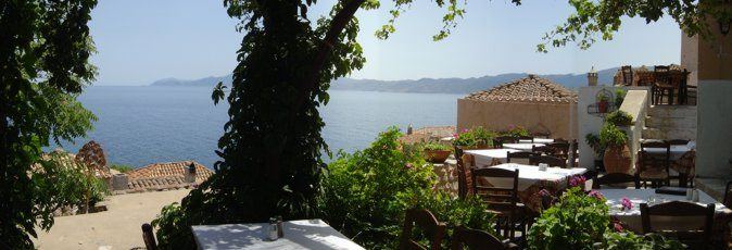 Eating out during your sailing holiday both gives you the local flavour of Greece and can provide you some stunning views of your surroundings. This view of in Monemvasia, looking south towards Cape Maleas