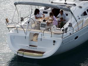 Enjoy the large cockpit & cockpit table for alfresco eating or relaxing after a day sailing. Image courtesey of Elan d.o.o.