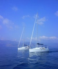 Two Greek Sails Jeanneau 36i yachts sailing together during a flotilla holiday