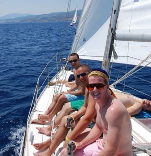 A crew endure the hard life of cabin charter yacht cruising with Greek Sails