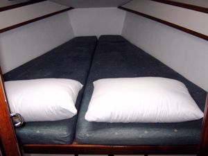 The forepeak cabin of a Sun Magic 44 sailing yacht available for flotilla sailing holidays and bareboat charter from Greek Sails, Poros, Greece