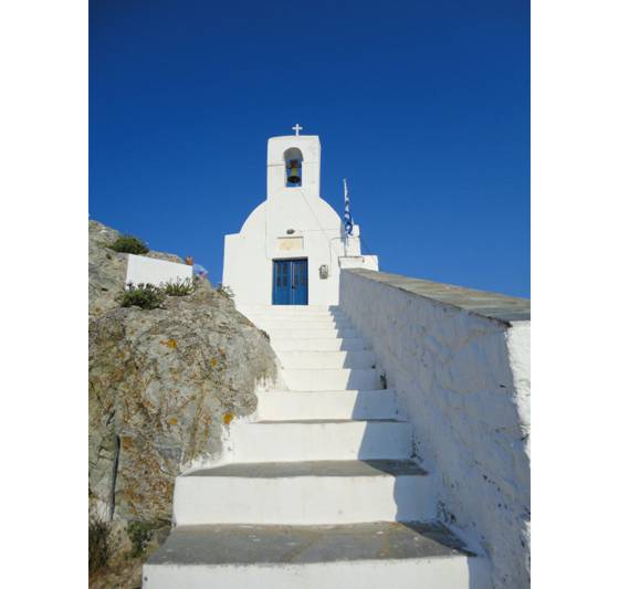 Sailing holiday locations in Greece: The church at the top of the chora from where you can gaze down on Livádhi and Órmos Livádhiou, Nísos Sérifos