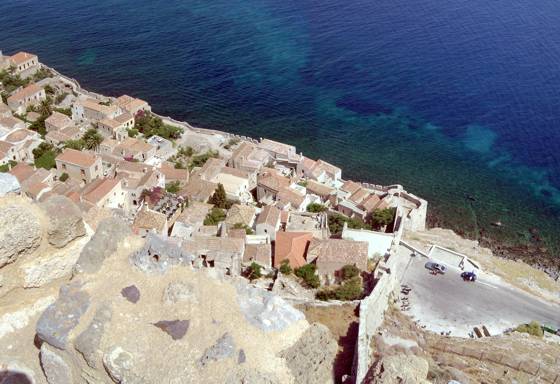 Sailing holiday locations in Greece: Looking down from the walls of the ‘upper town’ Monemvasia, over the walls and entrance to the ‘lower town’