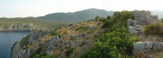 Sailing holiday locations in Greece: Parts of the ruined Mycenean acropolis on ák Kástro (Castle Cape)