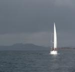 Stormy clouds at the boats make their way through the islands of northeast Sardinia