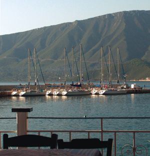 The Greek Sails flotilla holiday yachts rest in Leonidhion Plaka during a flotilla holiday in the Argolic Gulf, Greece