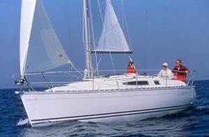 A Sun Odyssey 29.2 sailing yacht underway