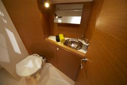 The toilet/wc (heads) of the Jeanneau Sun Odyssey 349 sailing yacht. Image courtesey & with permission of Chantiers Jeanneau S.A.