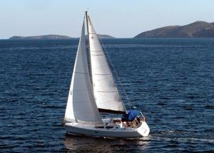 A Greek Sails Jeanneau Sun Odyssey 35 sailing yacht underway