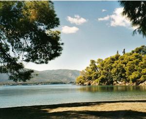 The beautiful ‘Love Bay’ on the island of Poros, Greece, home of Greek Sails