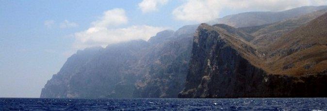 Sailing along the north coast of Amorgos in the Greek cyclades islands