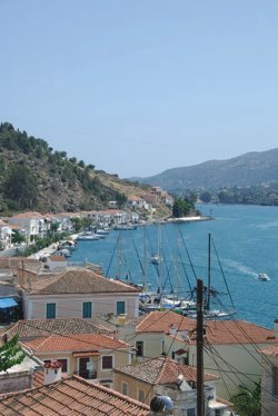 View of the south channel with Greek Sails’ flotilla & bareboat yacht charter base visible at the end of the quay to the right, Poros, Greece