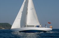 Yachts competing in the 2008 Round-the-Island race, going ‘round the cans’, Poros, Greece